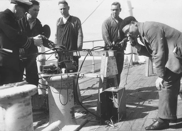 Photograph: Testing cable on Cable Ship "Faraday" laying trans Tasman submarine cable King Island.