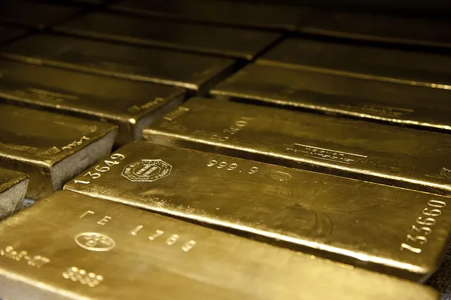Photograph: Stack of 400-ounce gold bars.