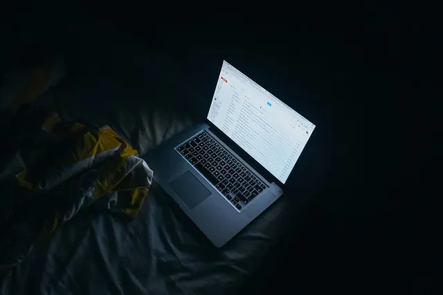 Photograph: Reading mail at night (Unsplash).